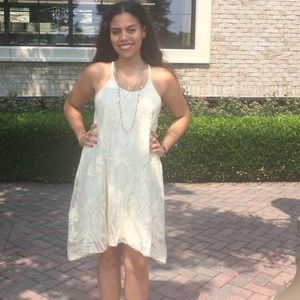 Francesca’s embroidered cream dress